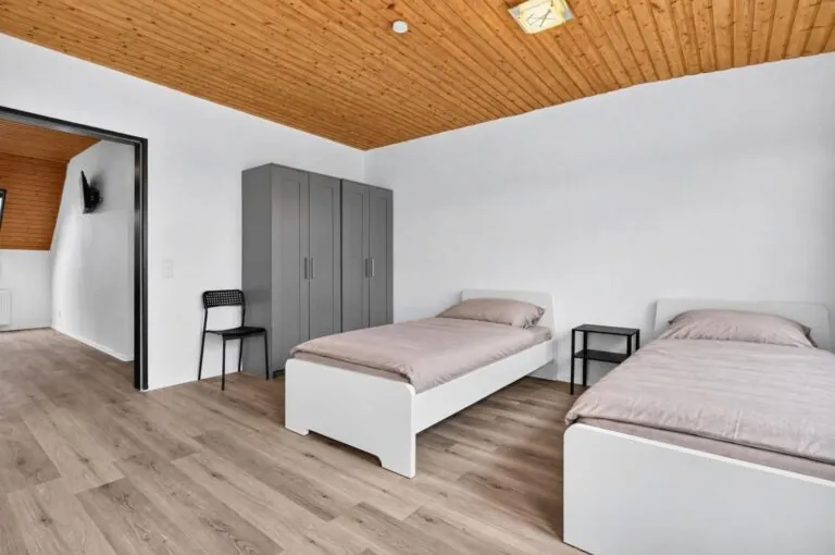 Schlafzimmer im Dachgeschoss-Apartment – Boardinghouse Solingen