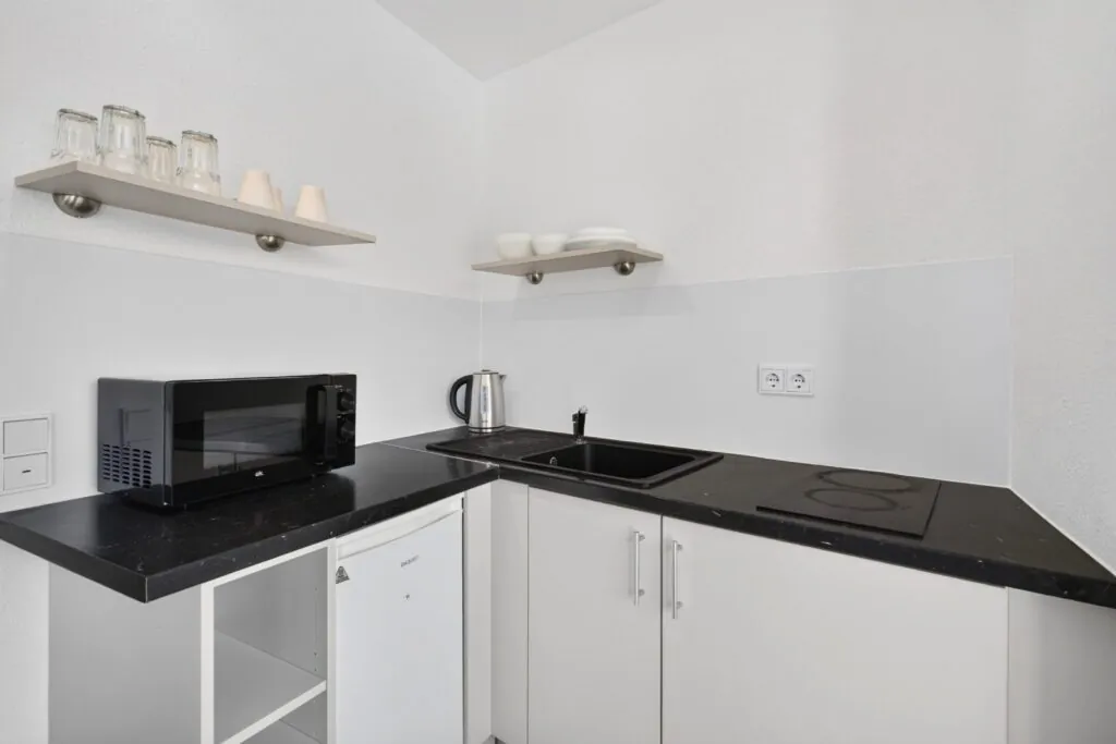 Küche in einem Apartment mit 4 Betten im Boardinghouse Solingen